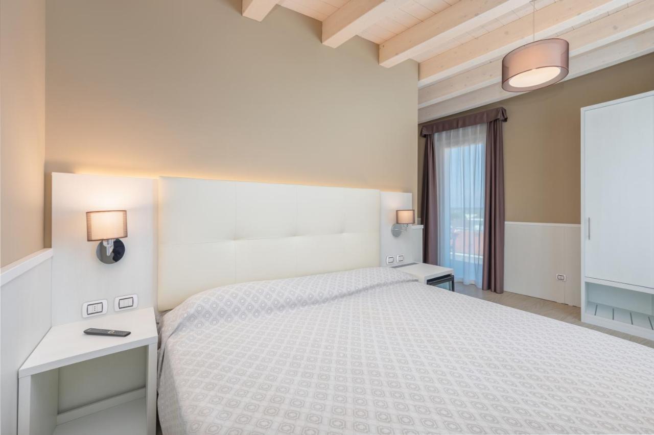 Hotel Garni' Serena Caorle Bagian luar foto
